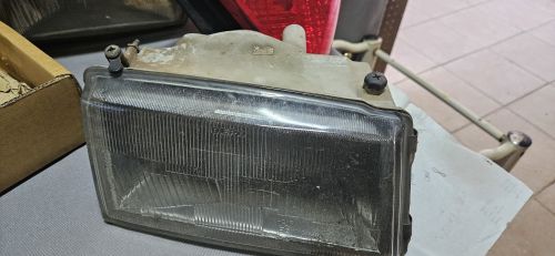 Assorted Vehicle Spares — Flywheel, Headlamps, Taillight & Air Filter