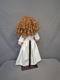 Porcelain Doll with Stand