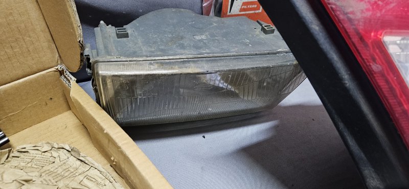 Assorted Vehicle Spares — Flywheel, Headlamps, Taillight & Air Filter