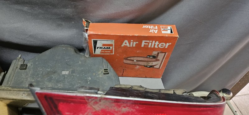 Assorted Vehicle Spares — Flywheel, Headlamps, Taillight & Air Filter