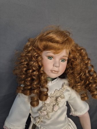 Porcelain Doll with Stand
