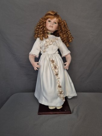 Porcelain Doll with Stand