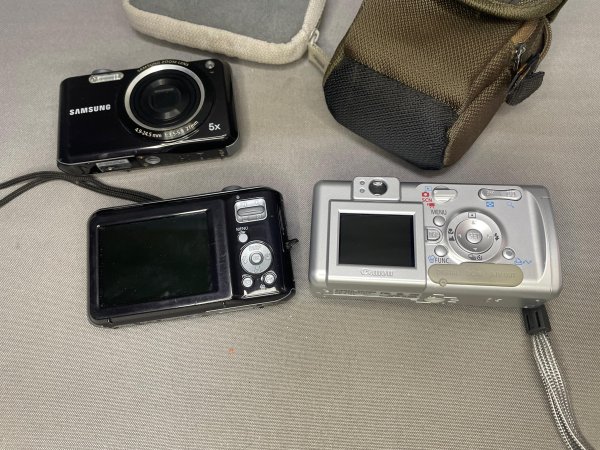 Vintage Digital Cameras ×3 — 2× Samsung + Canon PowerShot A400, with Bags