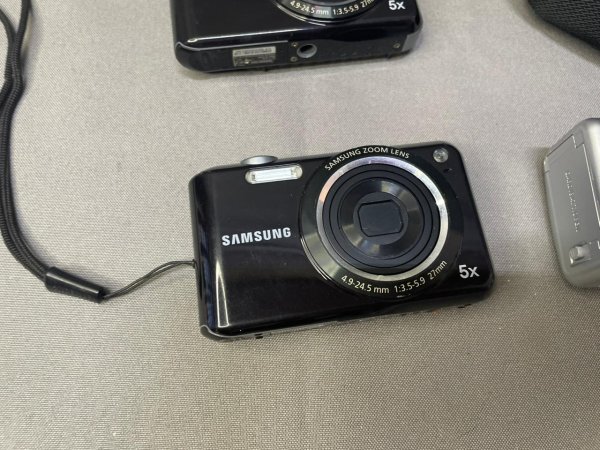 Vintage Digital Cameras ×3 — 2× Samsung + Canon PowerShot A400, with Bags
