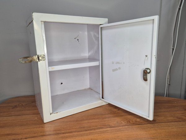 White Metal First-Aid Wall Cabinet — Lockable Hasp